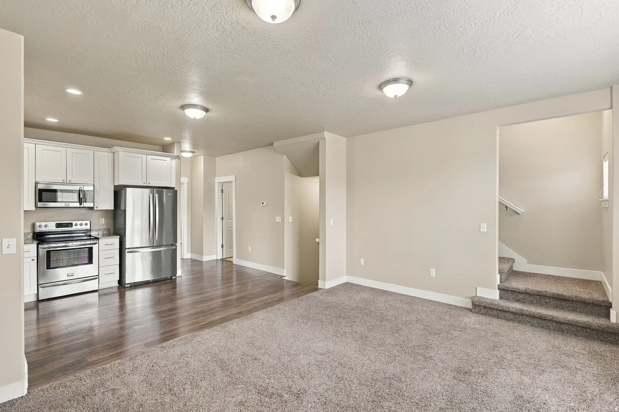 Open-concept living area with integrated kitchen