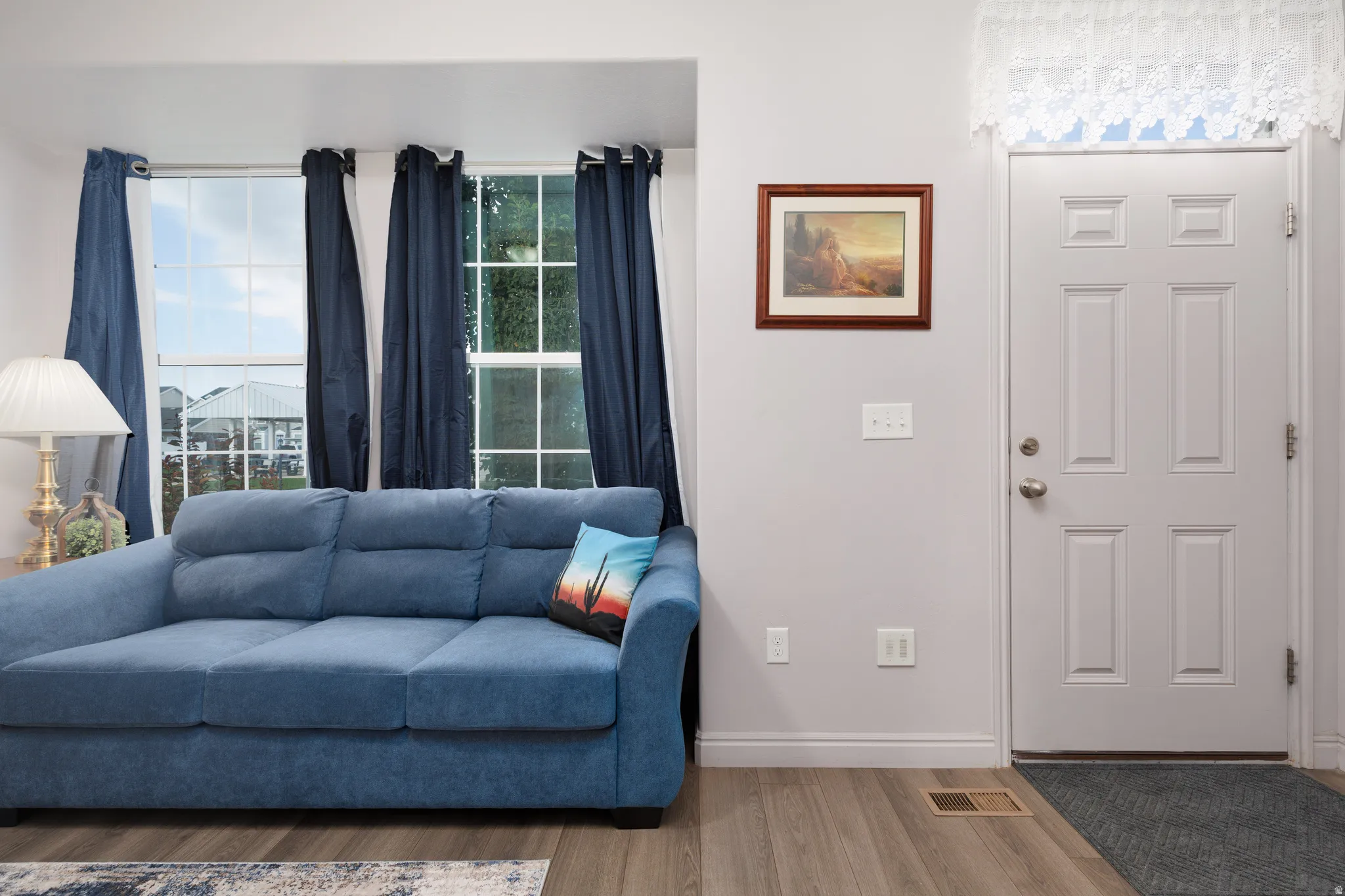 Wood-finish flooring throughout the space