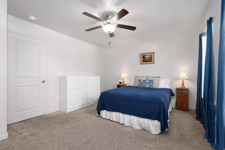 Neutral-toned carpeting throughout