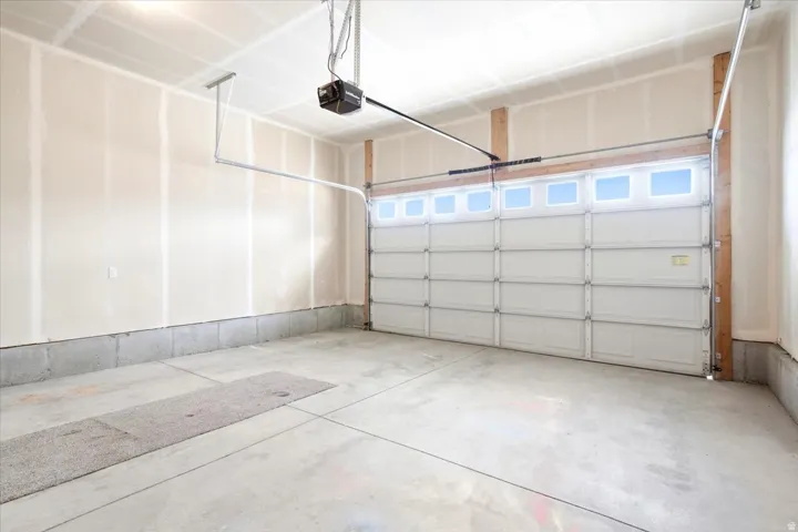Attached garage with an overhead automatic door opener