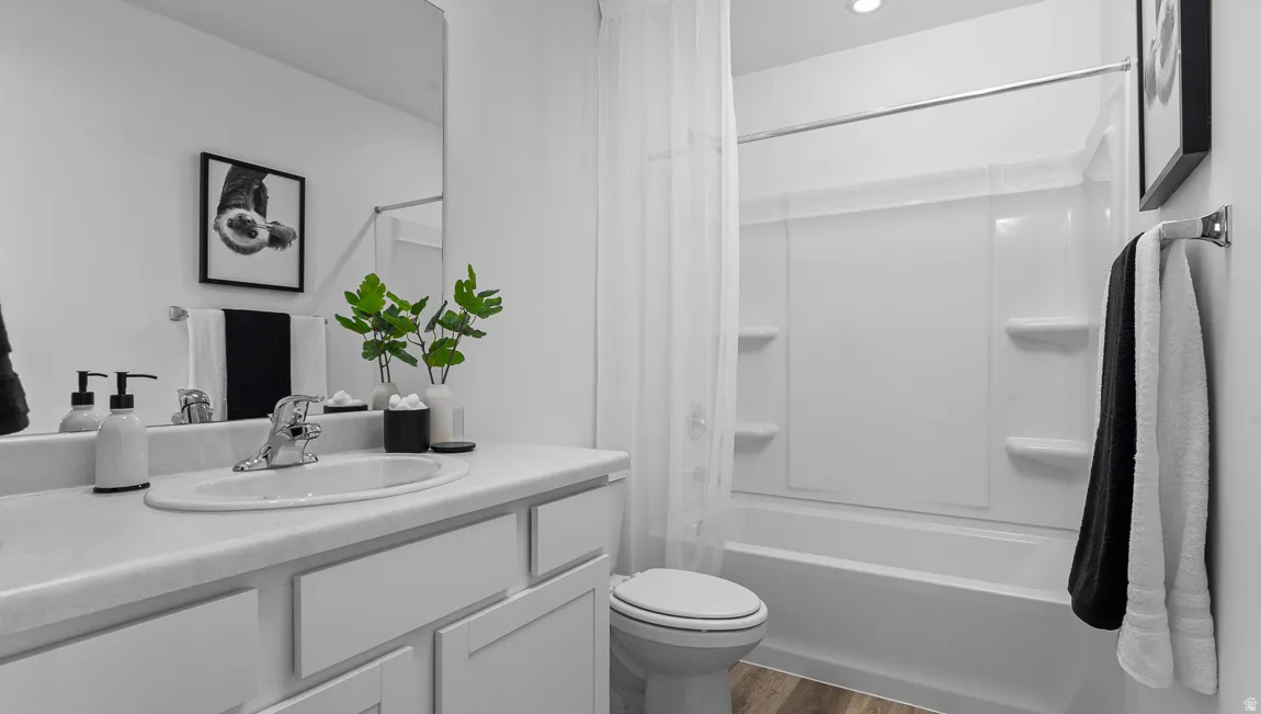 Vanity with integrated sink, chrome faucet, and cabinet storage