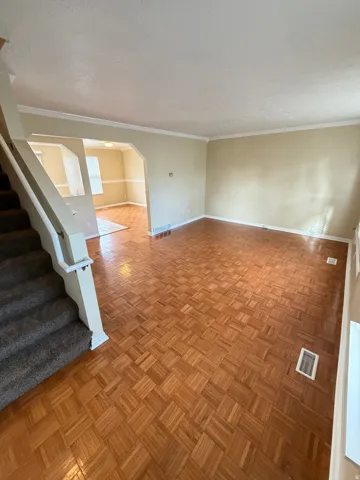 Parquet wood flooring throughout the main living area