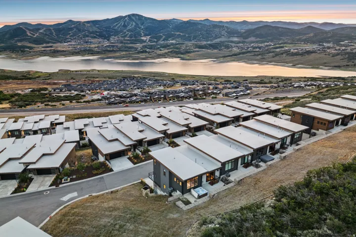 Modern residential community with contemporary architecture, flat rooflines, and a cohesive exterior design