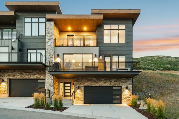 Modern exterior with stone accents and horizontal siding
