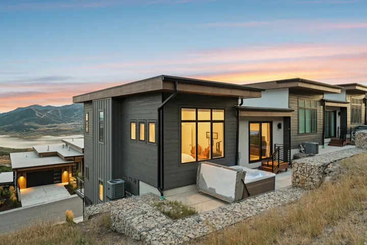 Modern architecture featuring a flat roof and multi-pane windows