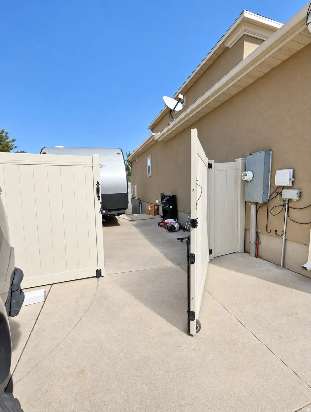 Concrete driveway with double gate access