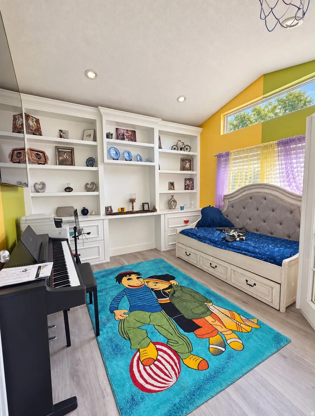 Built-in shelving with desk, vaulted ceiling, recessed lighting, wood-finish flooring, and transom window