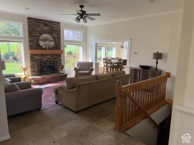 Stone-clad fireplace with a wood mantel