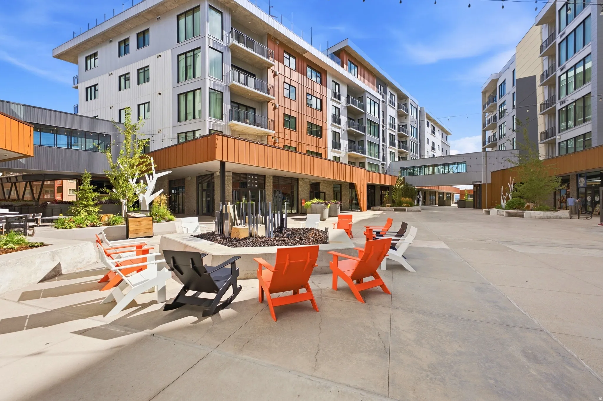 Expansive outdoor plaza featuring concrete hardscaping