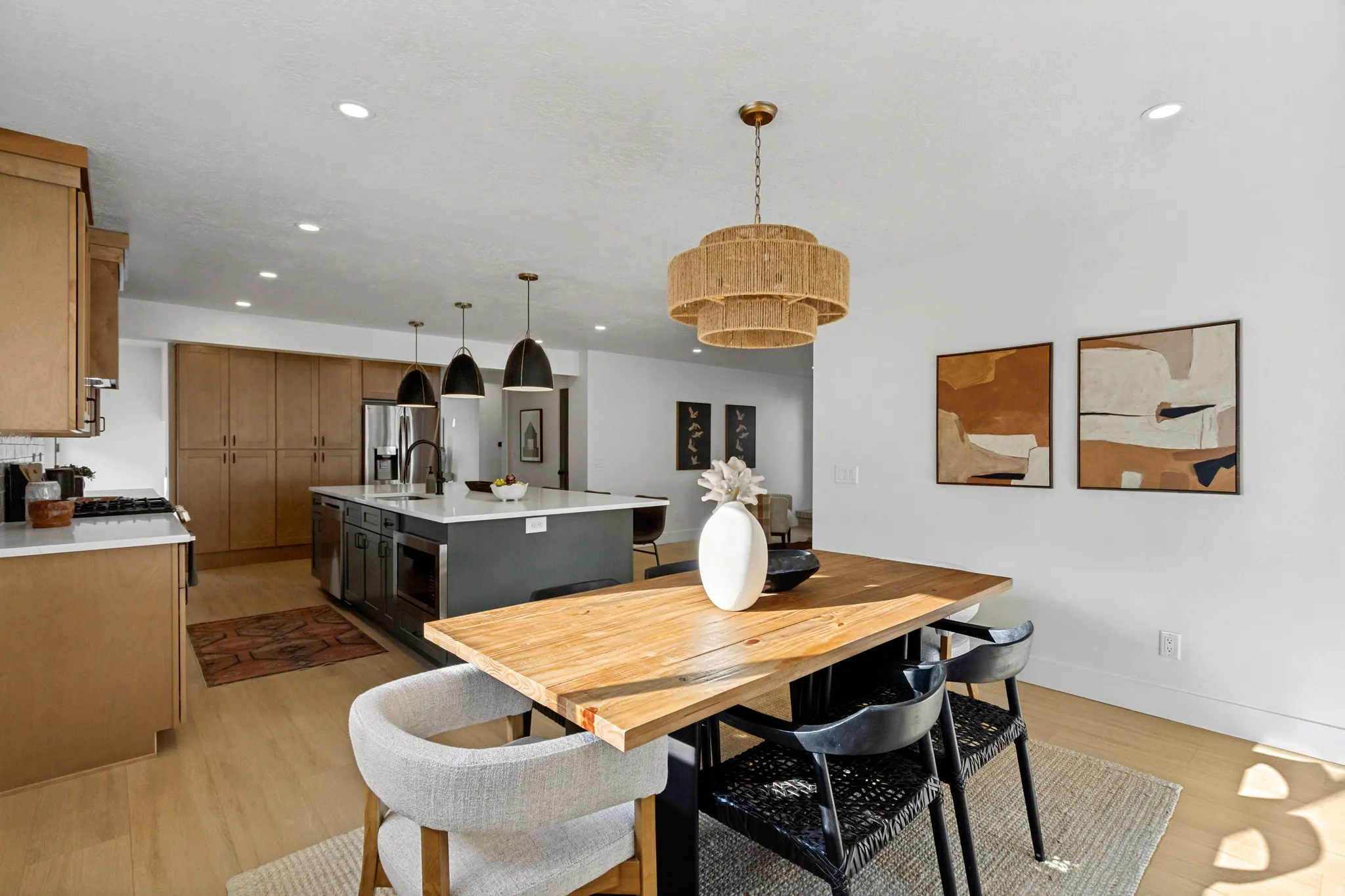 Light wood-finish flooring complements the neutral wall color