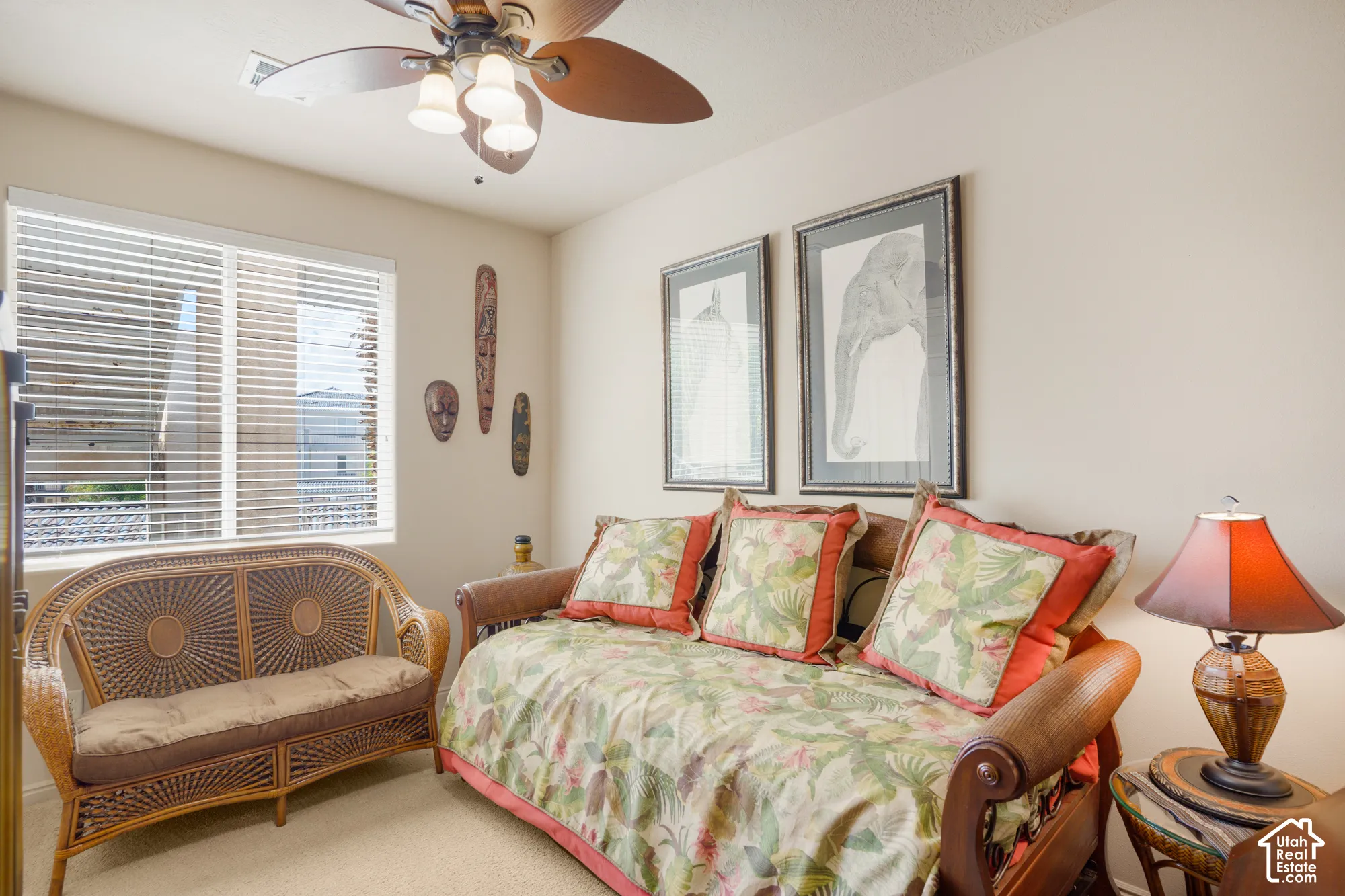 Window with horizontal blinds, ceiling fan with integrated lighting, and neutral wall paint