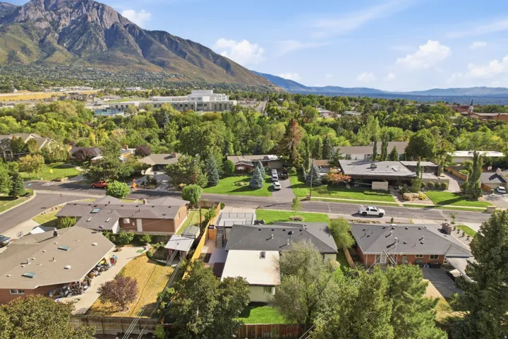 Neighborhood setting with established residential properties and mature trees