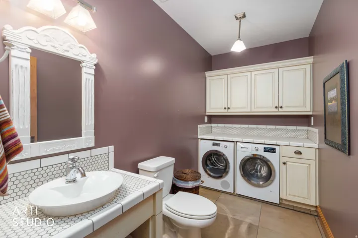 Main level half-bath, and laundry.