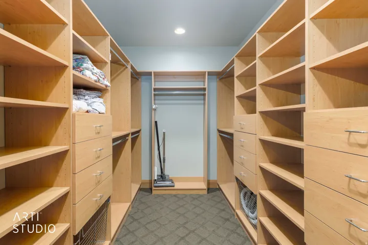 Master bdrm. Large walk-in closet. Custom   shelving system, Tons of space.