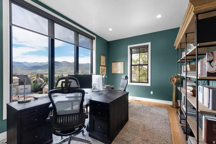 Expansive window wall with mountain scenery