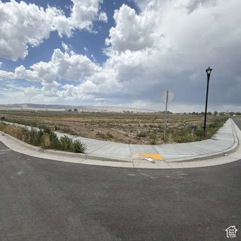 Paved street with concrete curbing and sidewalks
