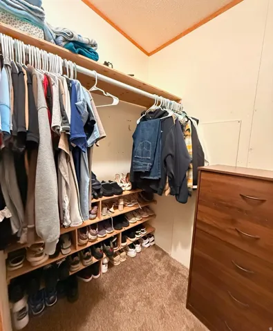 Built-in shelving and hanging rods for organized storage