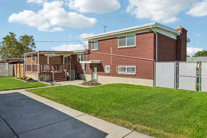 Red brick exterior with white trim