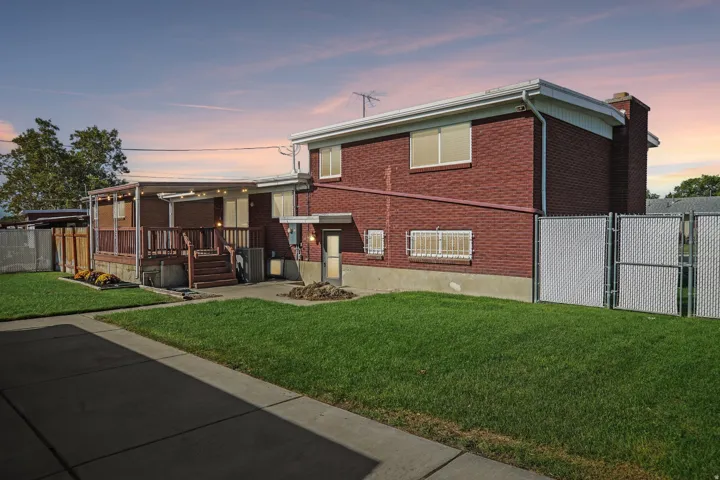 Red brick exterior with white trim