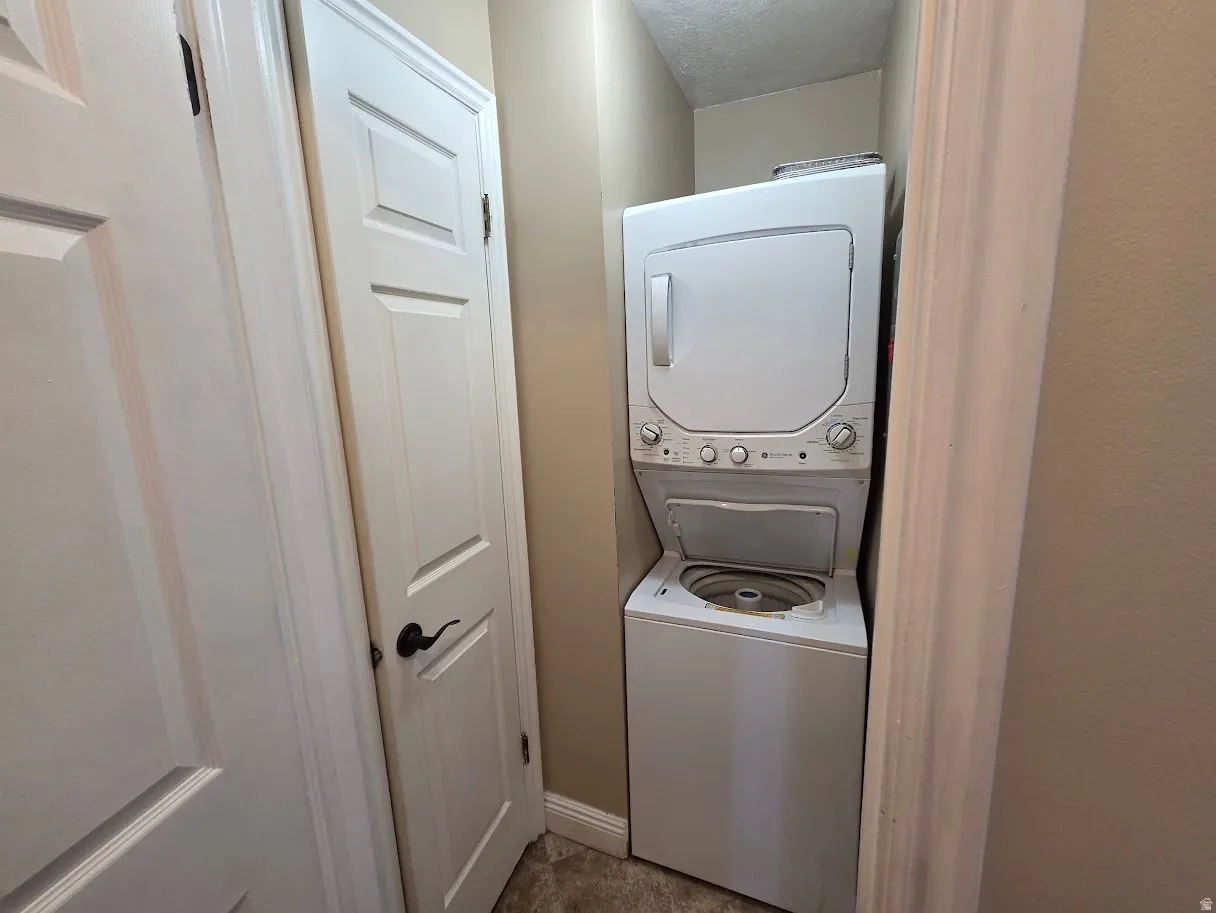 Stackable washer and dryer unit