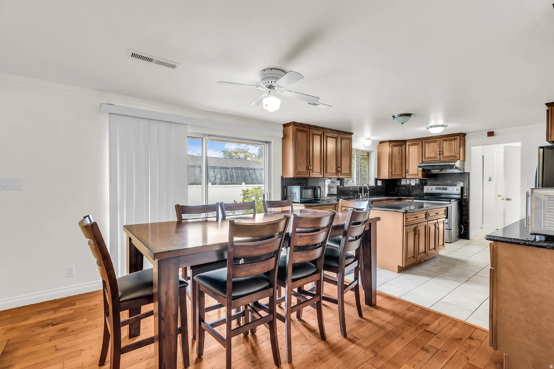 Wood-finish flooring throughout the dining area