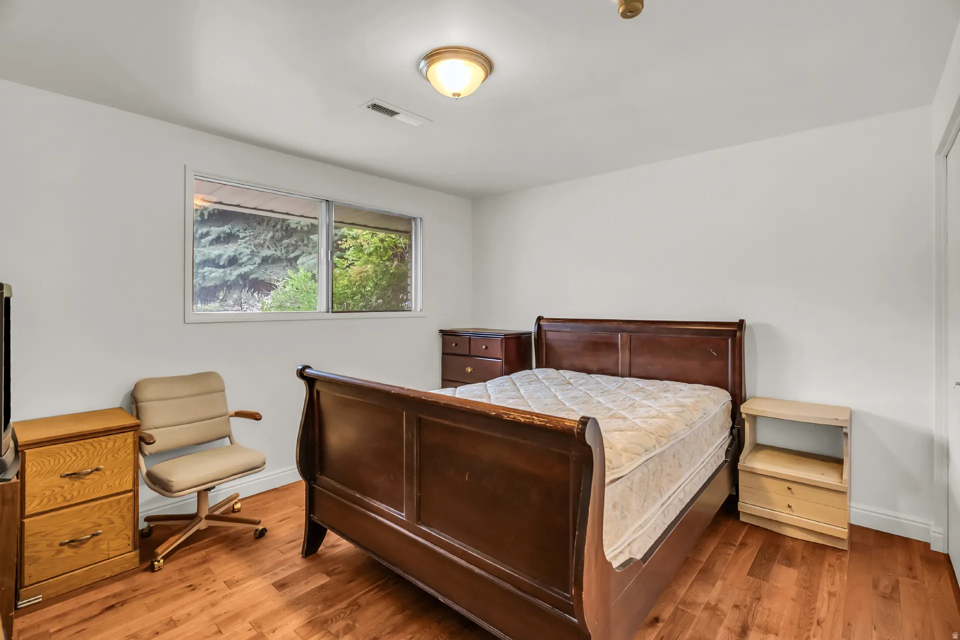 Wood-finish flooring with white walls