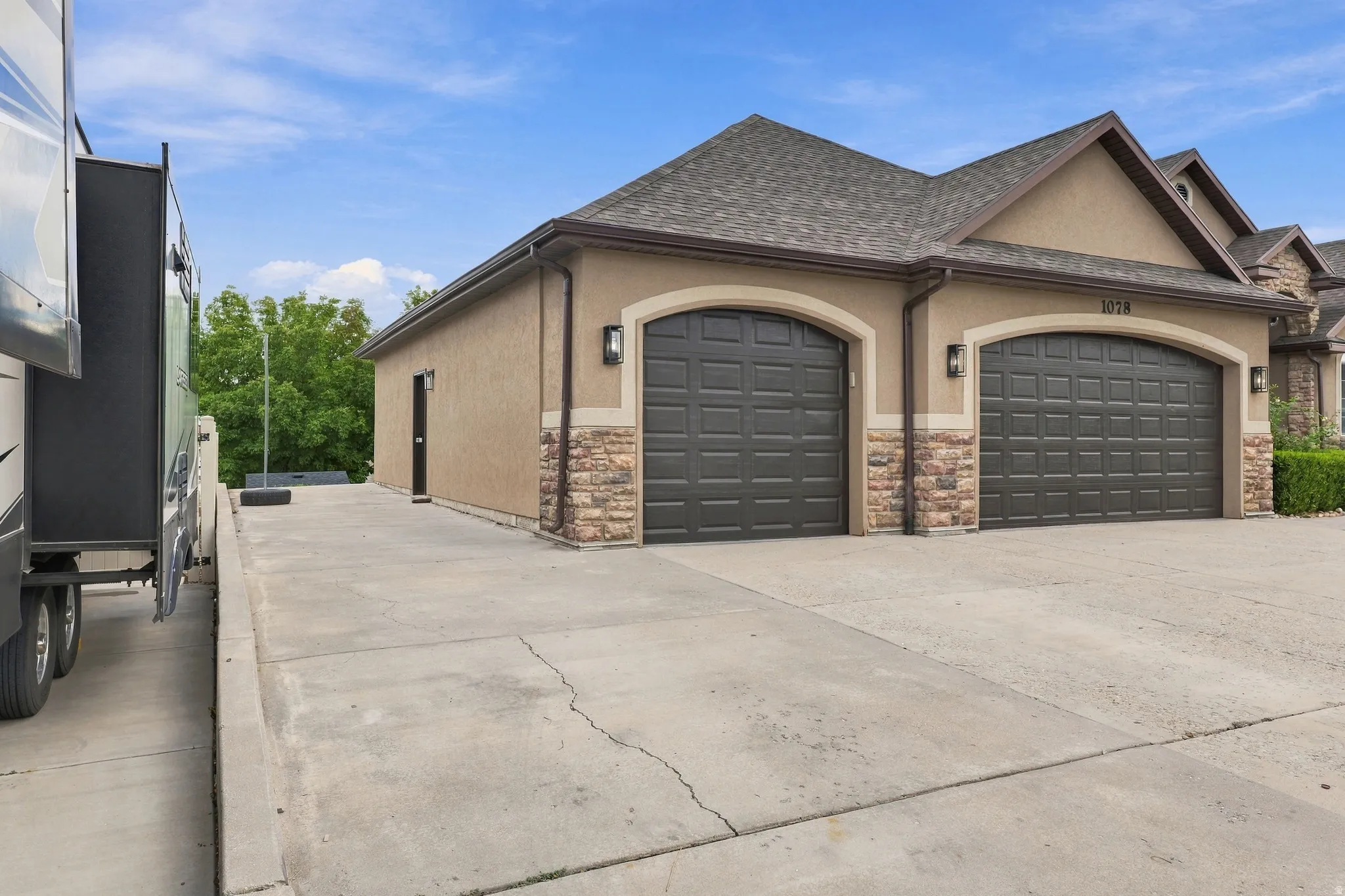 3 car extended bay garage with RV parking