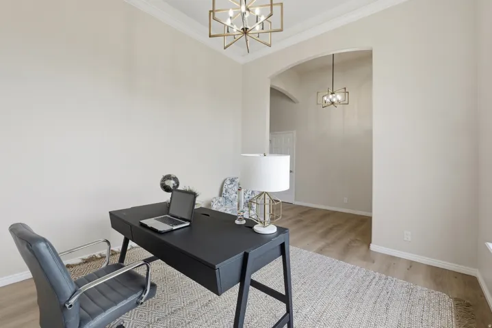 Formal living room (staged as an office)