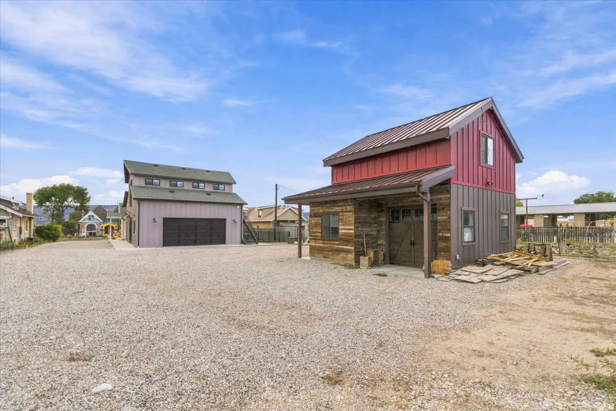 Gravel lot with two distinct structures