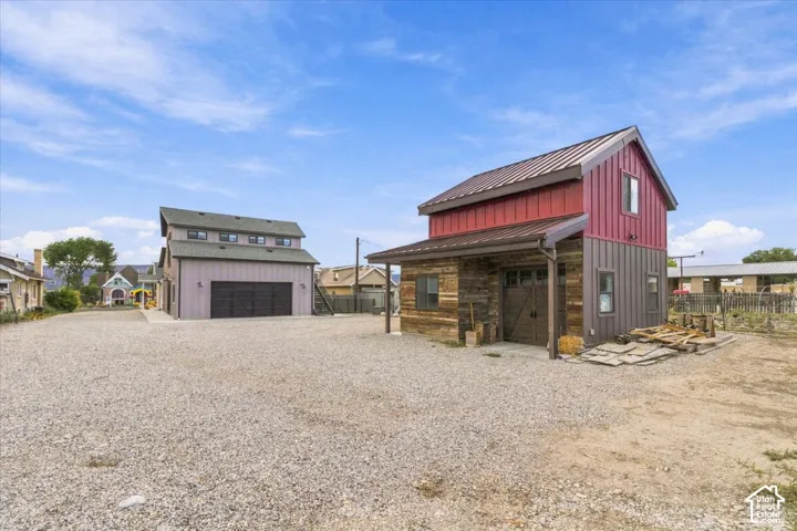 Gravel lot with two distinct structures
