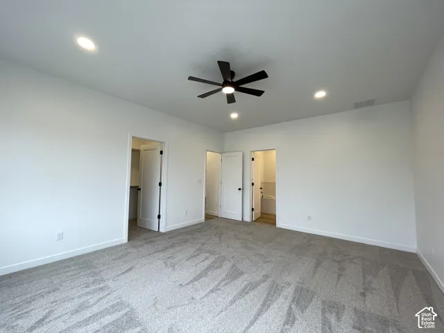Primary Bedroom, Neutral interior featuring carpeted flooring, recessed lighting, and a multi-blade ceiling fan