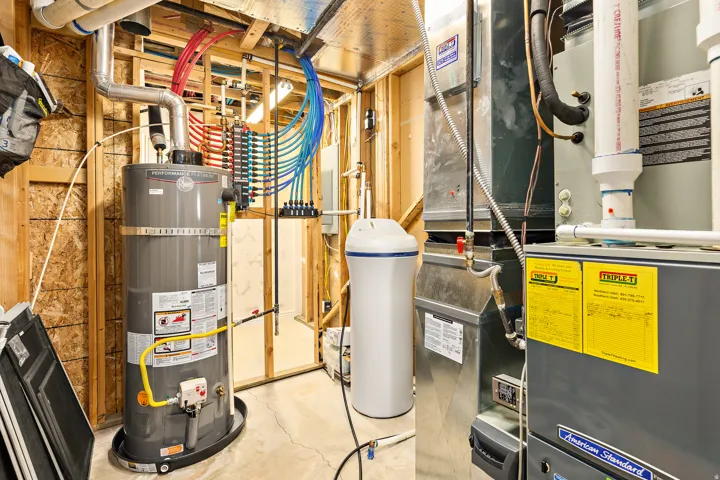 Water heater, PEX plumbing, water softener system, and American Standard HVAC unit