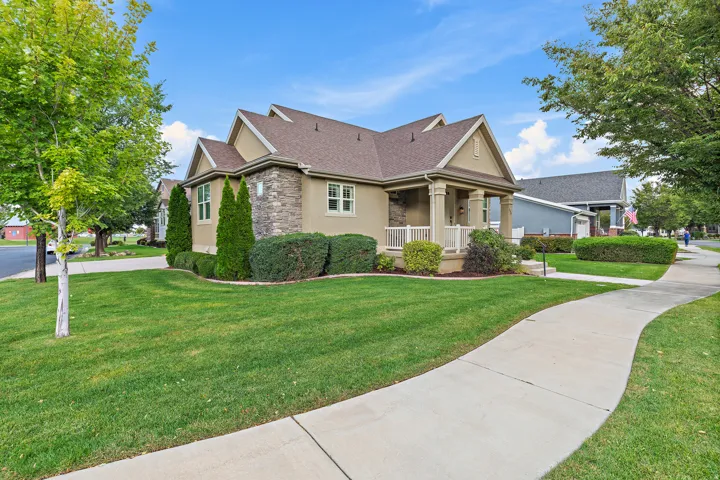Stucco and stone exterior with gabled roof lines