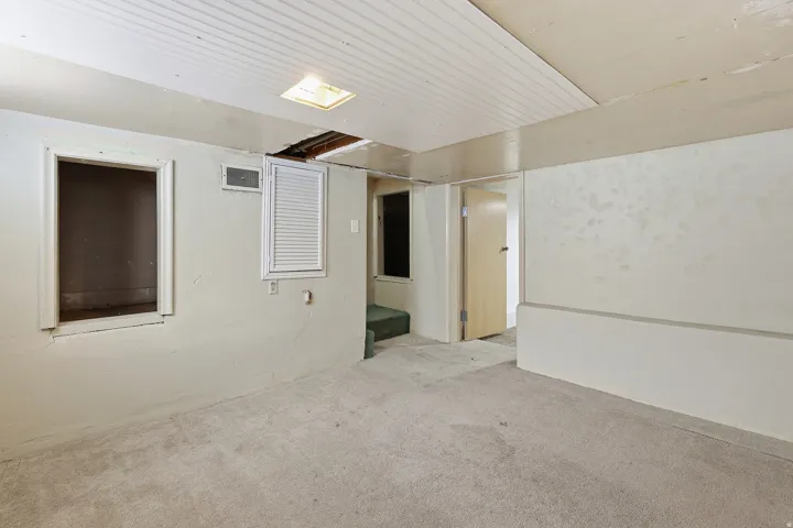 AdditionaBasement  Room– Connects several basement rooms, offering flexible layout options for storage, hobby space, or future finishing.l content