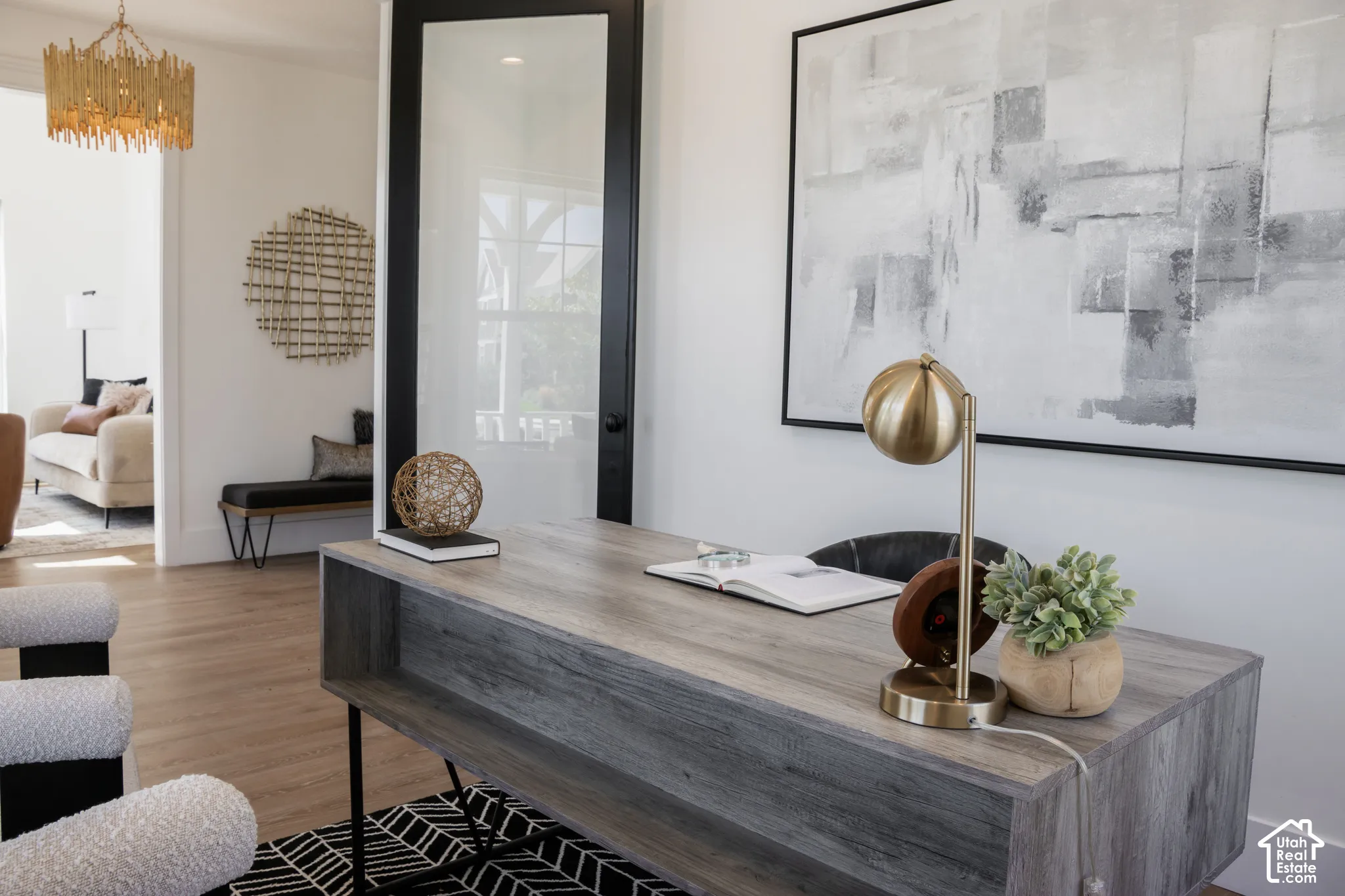 Wide plank wood-finish flooring throughout