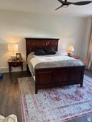 Wood-finish flooring with a modern ceiling fan