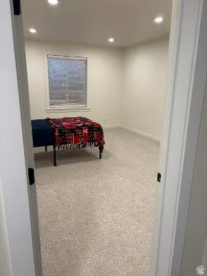 Neutral tone walls with recessed lighting