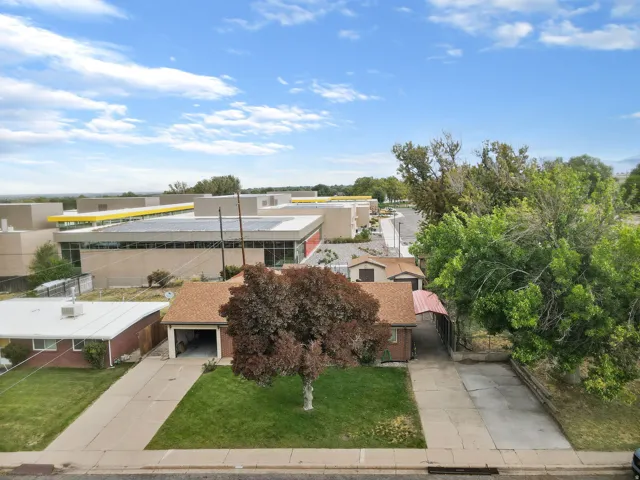 Expansive paved driveway and attached garage