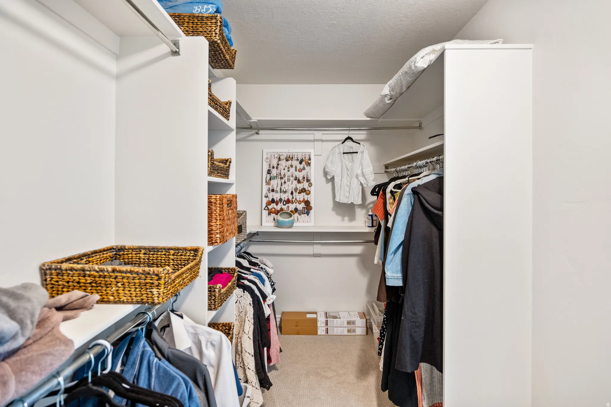 Built-in closet system featuring multiple shelves and hanging rods