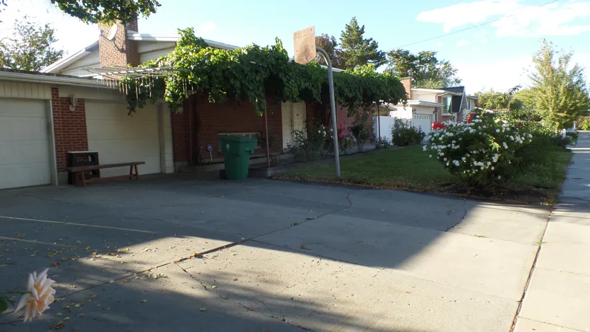Front Yard with 2-Car Garage and Extra Parking