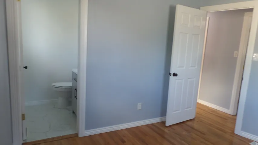 Owner's Bedroom with 1/2 Bathroom