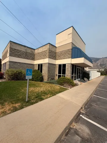 Multi-level commercial structure featuring block and stucco exterior finishes