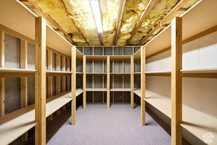 Built-in wood shelving units with ample storage capacity