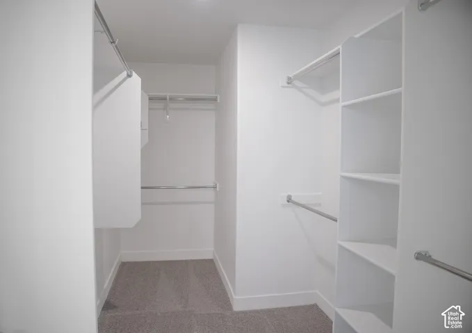 Large walk-in closet as part of primary suite.