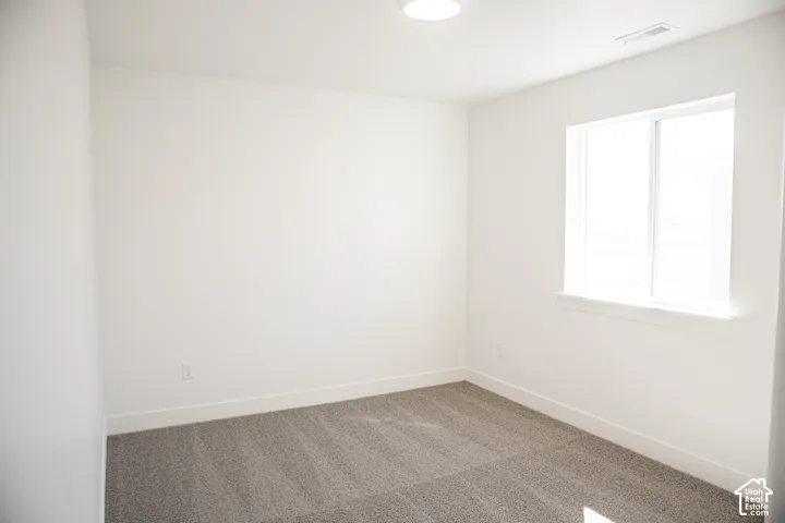 Bedroom #4 with walk-in closet.