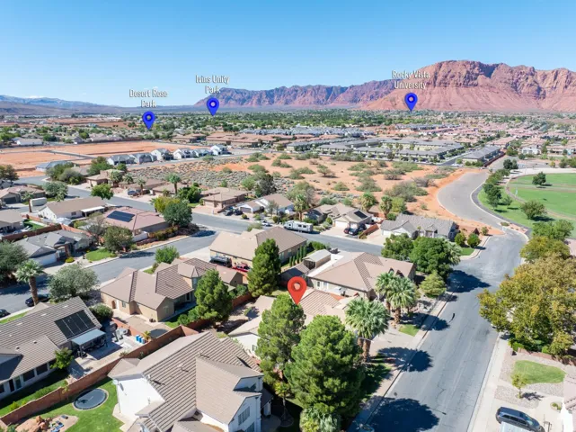 Residential neighborhood setting with visible mountain scenery