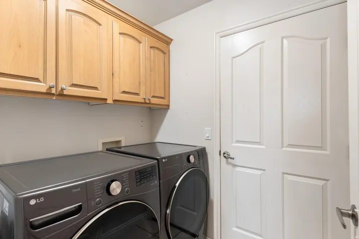 Built-in wood cabinetry with crown molding