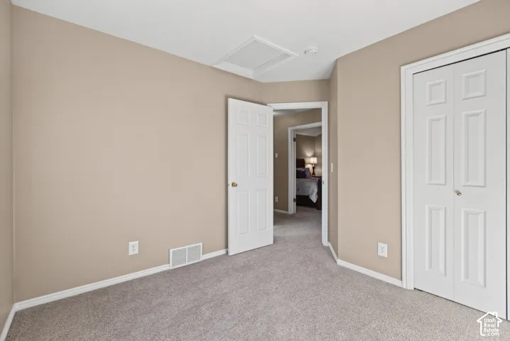 Plush carpeting and neutral-toned walls