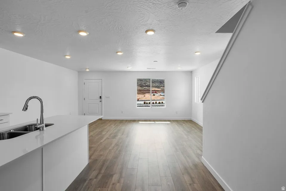 Kitchen island with a double basin sink and gooseneck faucet
