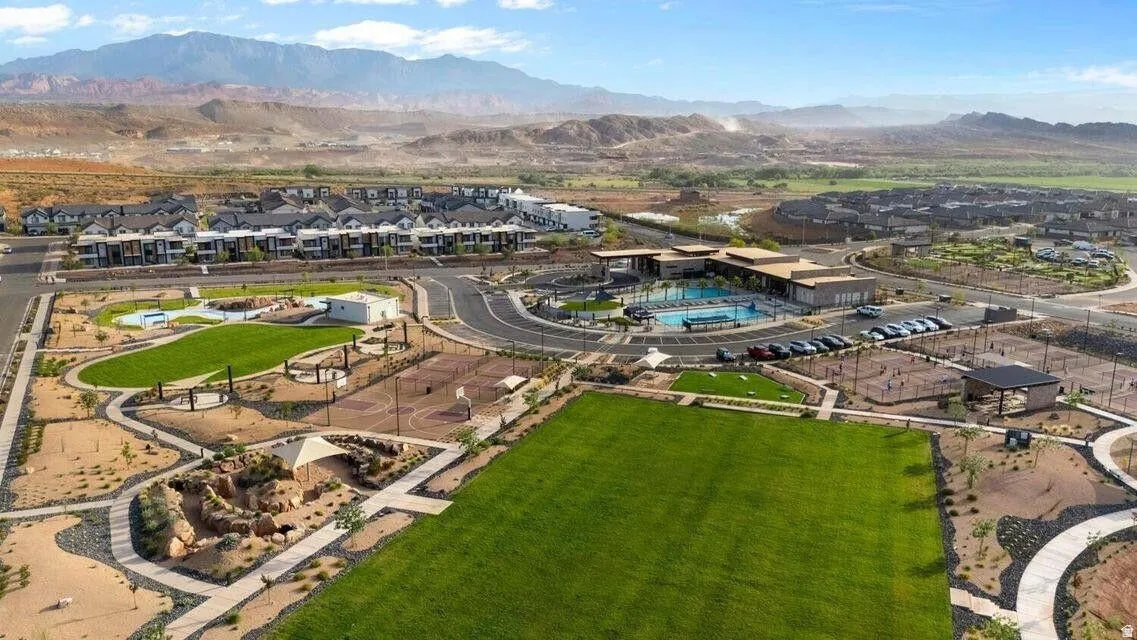 Community amenities featuring a clubhouse, swimming pool, sports courts, and green spaces